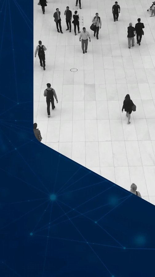 People walking in an airport terminal, modern transportation hub, travelers with luggage, busy airport scene, public transit, travel industry, crowded airport terminal, passenger movement, airport security, transportation infrastructure.